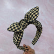 Load image into Gallery viewer, Black and Tan Checkered BellaBow